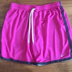 Pink Nike basketball shorts